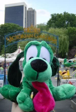 stuffed green dog with long ears and very long pink tongue