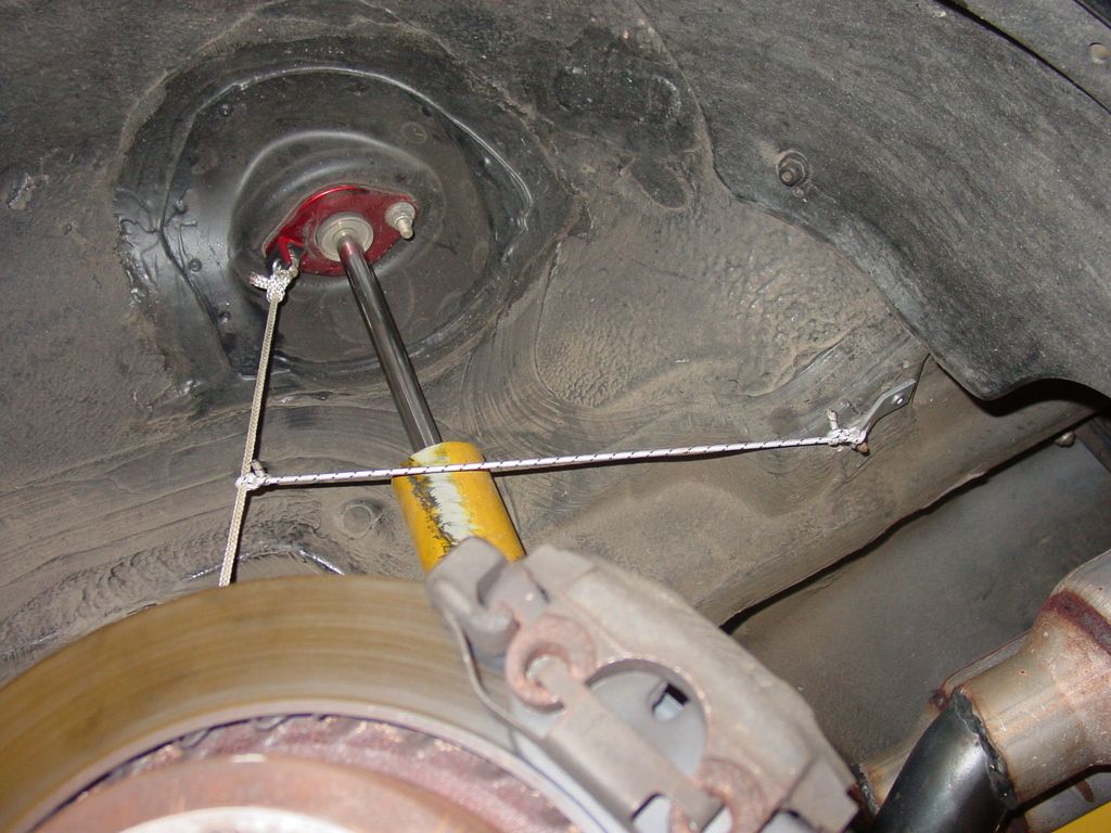 rear spring falls out at full droop on e36, whats good fix?