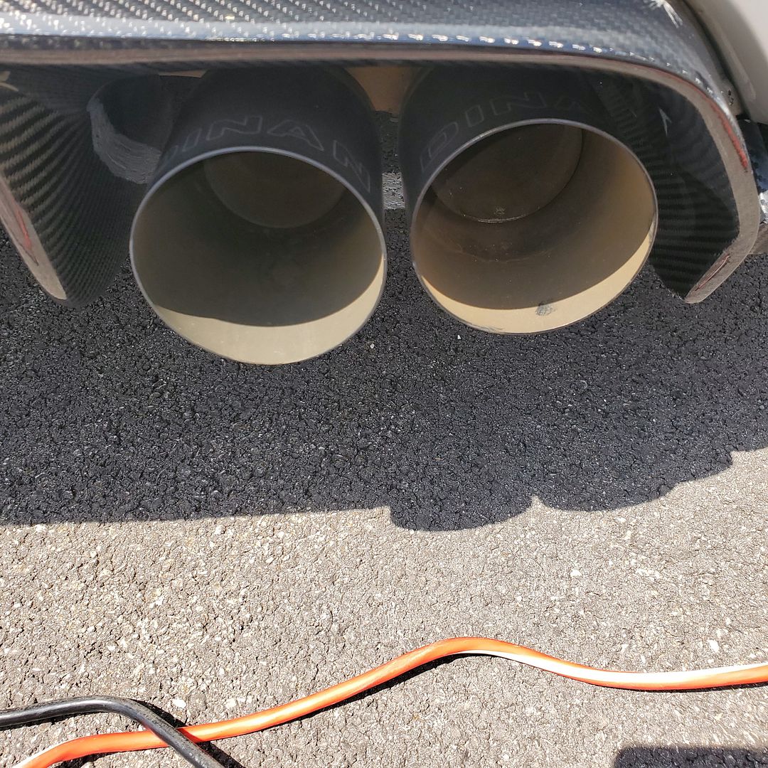 How do I remove orange residue inside black dinan exhaust tips